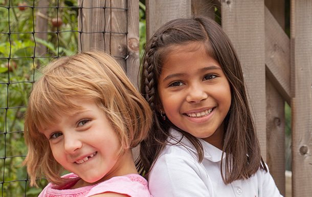 Two kids smiling